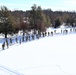 Cold-Weather Operations Course class 21-04 students conduct field training in snowshoes, pulling sleds