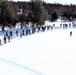 Cold-Weather Operations Course class 21-04 students conduct field training in snowshoes, pulling sleds