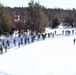 Cold-Weather Operations Course class 21-04 students conduct field training in snowshoes, pulling sleds