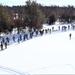 Cold-Weather Operations Course class 21-04 students conduct field training in snowshoes, pulling sleds