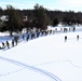 Cold-Weather Operations Course class 21-04 students conduct field training in snowshoes, pulling sleds