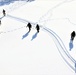 Cold-Weather Operations Course class 21-04 students conduct field training in snowshoes, pulling sleds