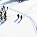 Cold-Weather Operations Course class 21-04 students conduct field training in snowshoes, pulling sleds