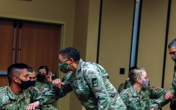 U.S. Air Force COVID-19 response team conduct deployment brief