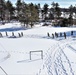 Fort McCoy CWOC class 21-04 students conduct field training in snowshoes, pulling sleds