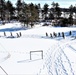 Fort McCoy CWOC class 21-04 students conduct field training in snowshoes, pulling sleds
