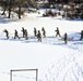 Fort McCoy CWOC class 21-04 students conduct field training in snowshoes, pulling sleds