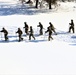 Fort McCoy CWOC class 21-04 students conduct field training in snowshoes, pulling sleds