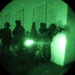 Team of Brazilian Paratroopers with weapons during night operations at JRTC 21-04