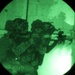 Brazilian Paratroopers ready weapon around corner during night operations at JRTC 21-04