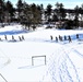 Fort McCoy CWOC class 21-04 students conduct field training in snowshoes, pulling sleds