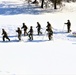 Fort McCoy CWOC class 21-04 students conduct field training in snowshoes, pulling sleds