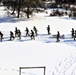 Fort McCoy CWOC class 21-04 students conduct field training in snowshoes, pulling sleds