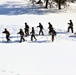 Fort McCoy CWOC class 21-04 students conduct field training in snowshoes, pulling sleds