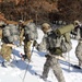 Fort McCoy CWOC class 21-04 students conduct field training in snowshoes, pulling sleds