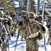 Cold-Weather Operations Course class 21-04 students conduct field training in snowshoes, pulling sleds