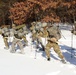 Cold-Weather Operations Course class 21-04 students conduct field training in snowshoes, pulling sleds