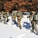 Cold-Weather Operations Course class 21-04 students conduct field training in snowshoes, pulling sleds