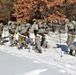 Cold-Weather Operations Course class 21-04 students conduct field training in snowshoes, pulling sleds