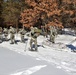 Cold-Weather Operations Course class 21-04 students conduct field training in snowshoes, pulling sleds