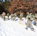 Cold-Weather Operations Course class 21-04 students conduct field training in snowshoes, pulling sleds