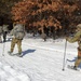 Cold-Weather Operations Course class 21-04 students conduct field training in snowshoes, pulling sleds