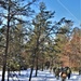 Cold-Weather Operations Course class 21-04 students conduct field training in snowshoes, pulling sleds