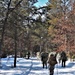 Cold-Weather Operations Course class 21-04 students conduct field training in snowshoes, pulling sleds