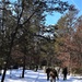 Cold-Weather Operations Course class 21-04 students conduct field training in snowshoes, pulling sleds