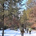 Cold-Weather Operations Course class 21-04 students conduct field training in snowshoes, pulling sleds