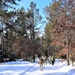 Cold-Weather Operations Course class 21-04 students conduct field training in snowshoes, pulling sleds