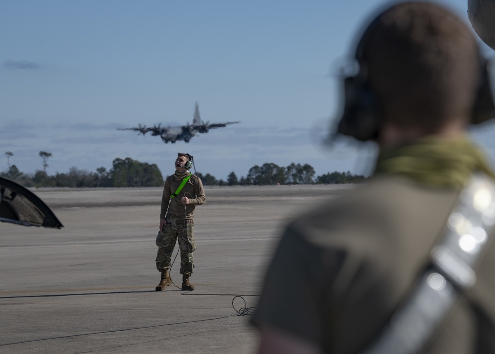 901st SOAMXS members prepare an MC-130H for training sortie