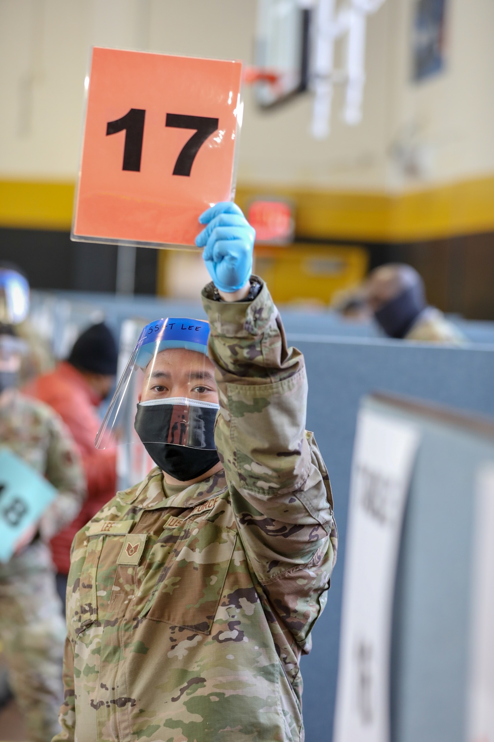 U.S. Air Force Airmen provide support on the opening day at the Medgar Evers College COVID-19 Community Vaccination Center