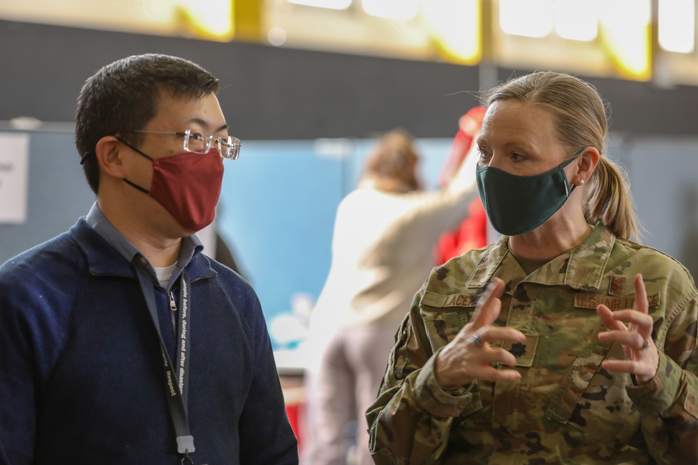 U.S. Air Force Airmen provide support on the opening day at the Medgar Evers College COVID-19 Community Vaccination Center