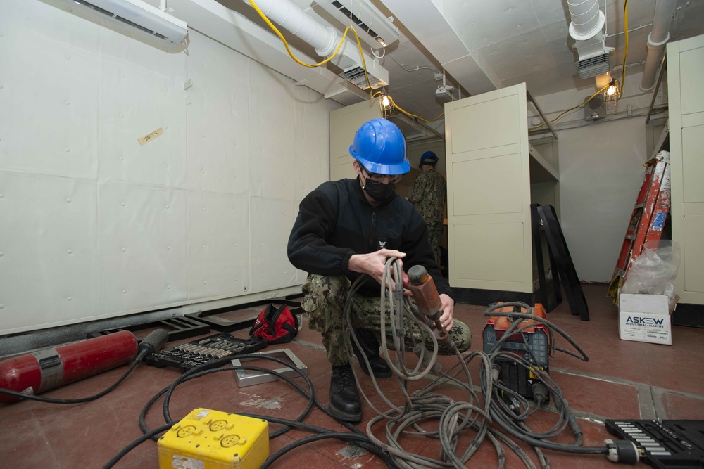 USS Ronald Reagan Stowing Parts