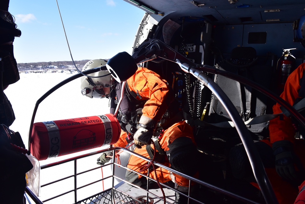 Air Station Traverse City conducts ice rescue hoist training near Houghton, Mich.