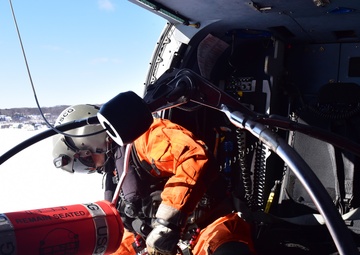 Air Station Traverse City conducts ice rescue hoist training near Houghton, Mich.