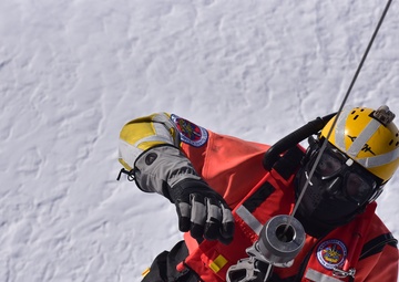 Air Station Traverse City conducts ice rescue hoist training near Houghton, Mich.