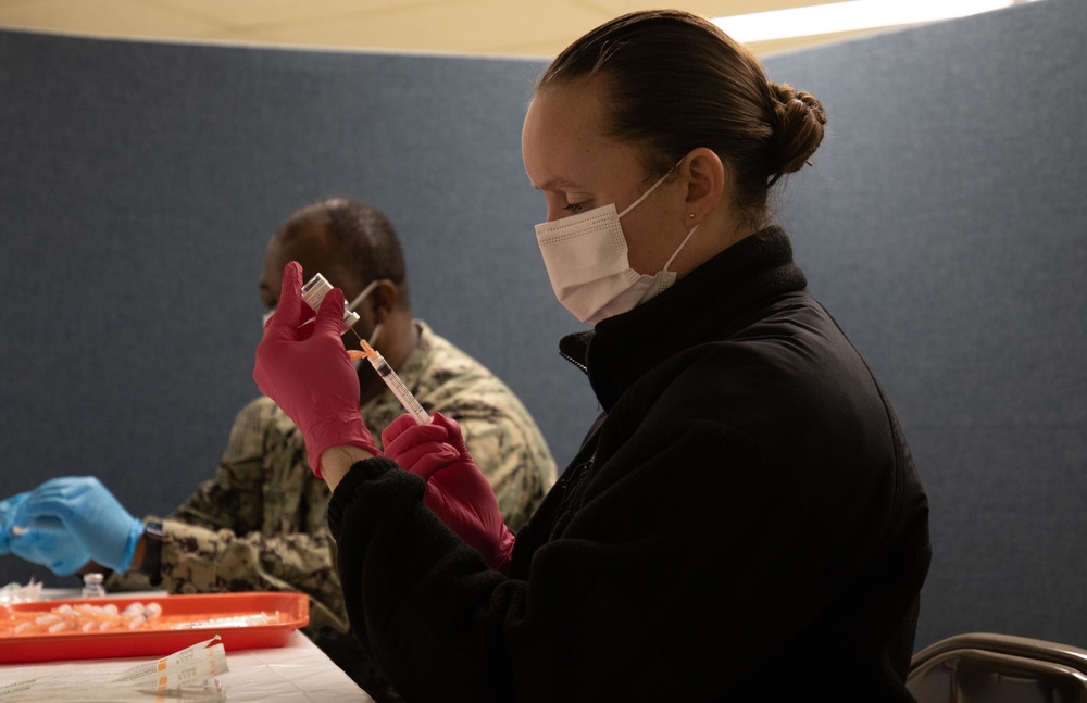 Service members support the Calvary Baptist Church COVID-19 Community Vaccination Center