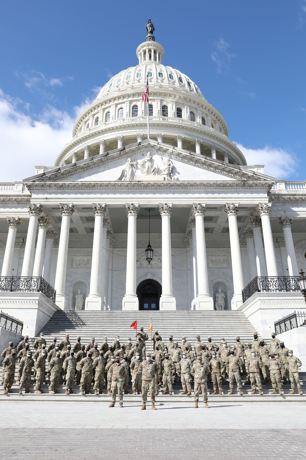 New Jersey National Guard soldiers take photo in front of Capitol steps