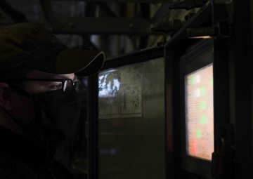Sailor operates elevator