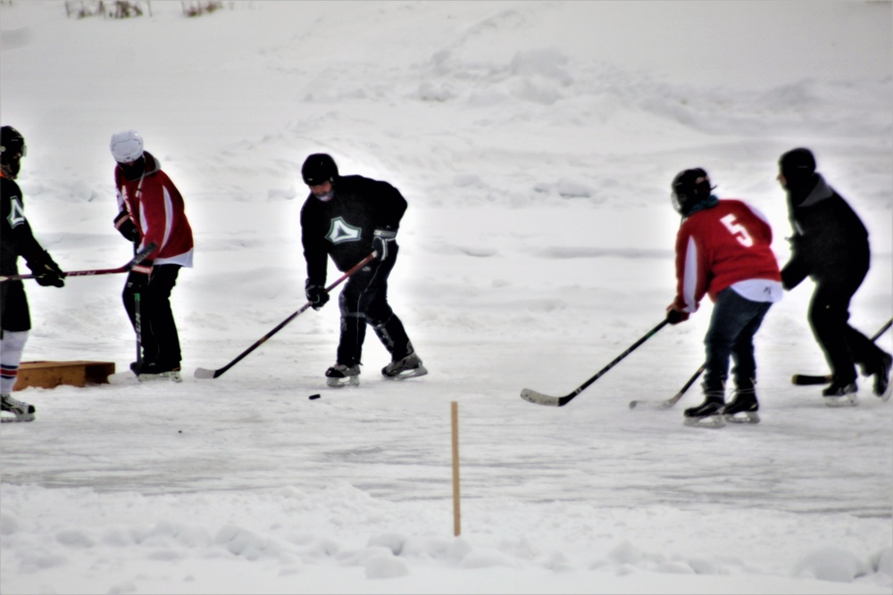 Pond hockey tourney action at Fort McCoy