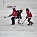 Pond hockey tourney action at Fort McCoy