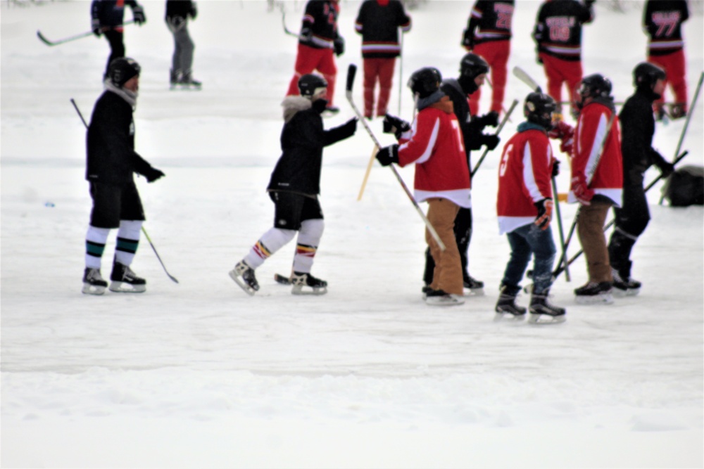 Pond hockey tourney action at Fort McCoy