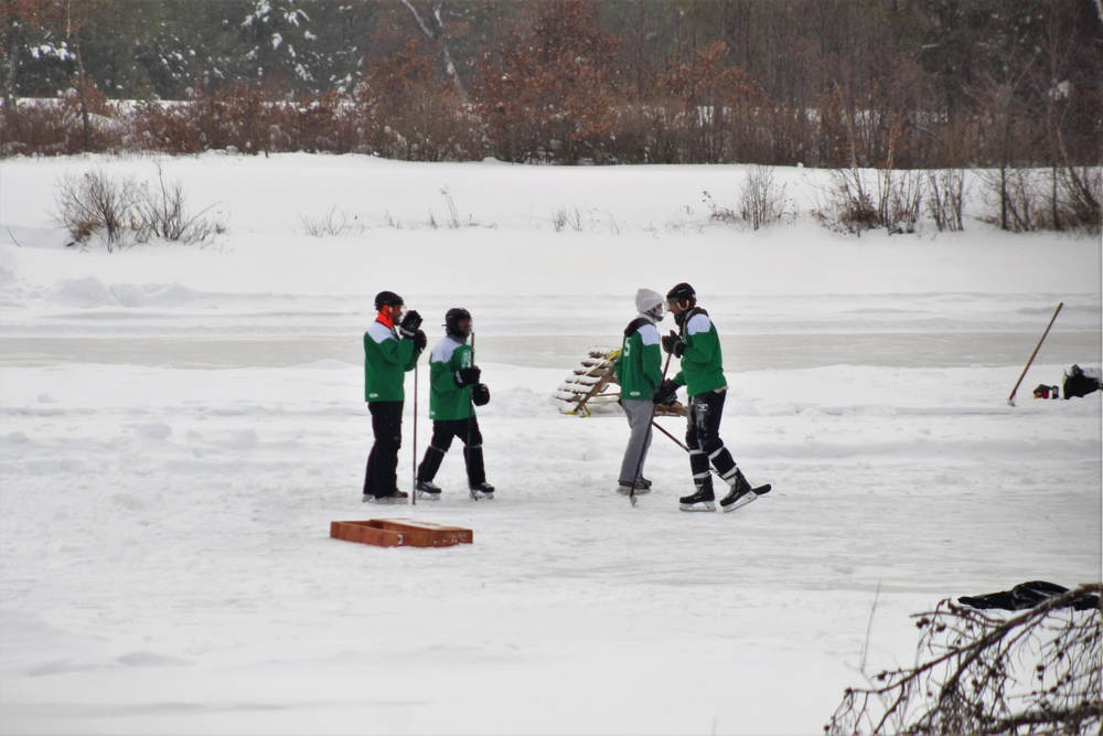 Pond hockey tourney action at Fort McCoy