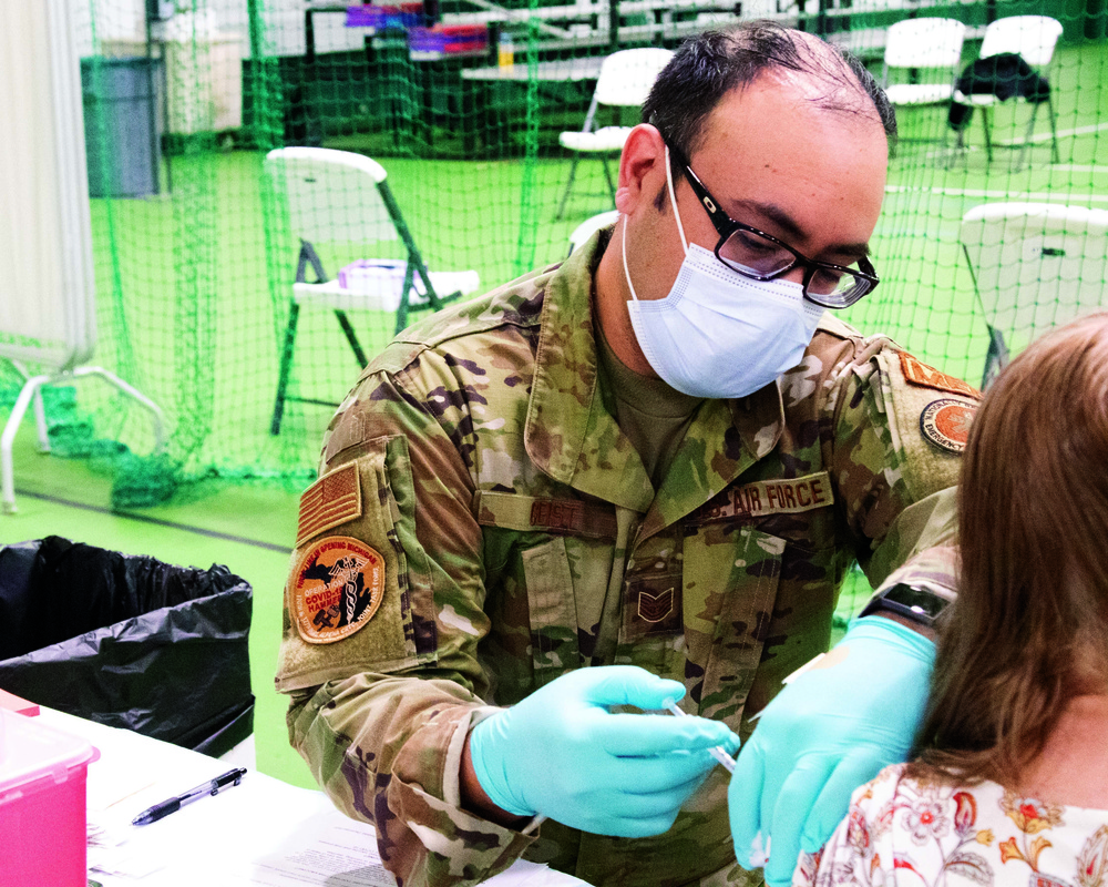 The Michigan National Guard delivers COVID-19 vaccine to YMCA