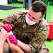 The Michigan National Guard delivers COVID-19 vaccine to YMCA