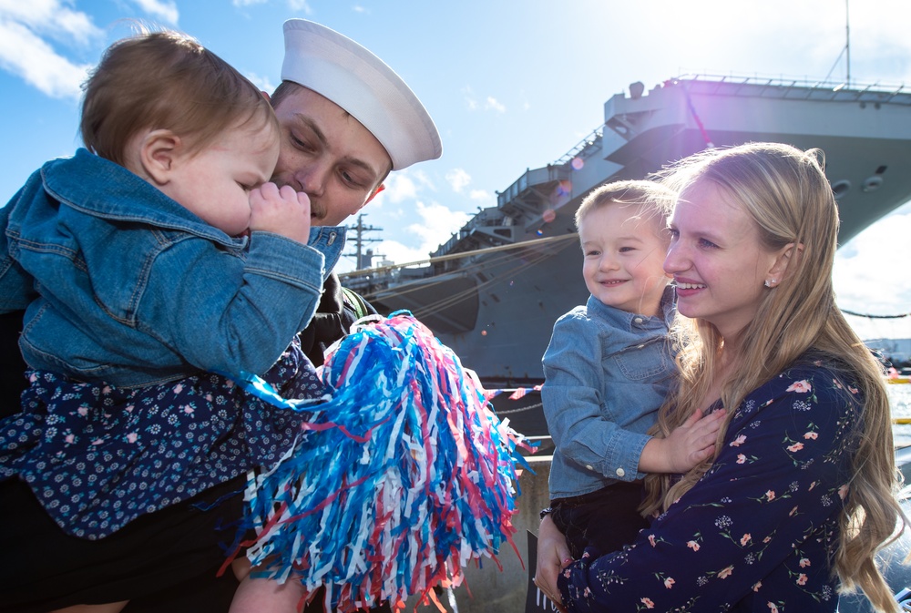 Nimitz Sailor Greets Family after Traditional First Kiss