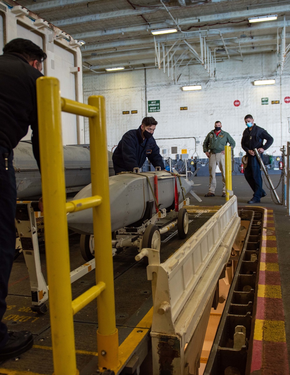 Ford Sailors Load Equipment