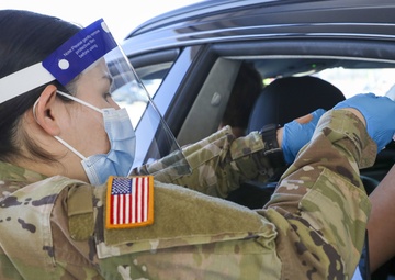 Female U.S. Army Soldiers assist at Dallas CVC on International Women’s Day
